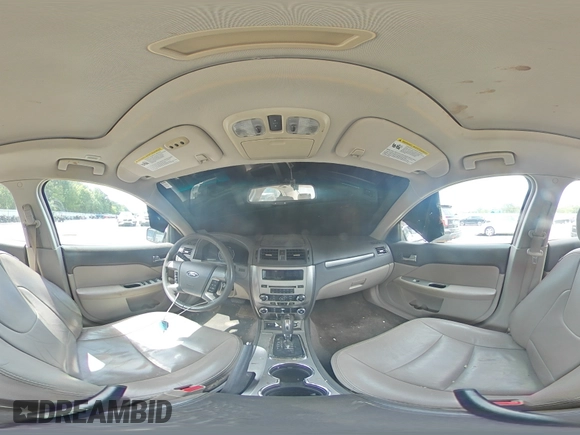 2012 Ford Fusion Hybrid с VIN 3FADP0L35CR184476, выставлен на аукционе Copart как лот 63907885 с пробегом 230 589 миль миль и Списание • Salvage title. История ставок и продаж доступна на DreamBid. Изображение 15.