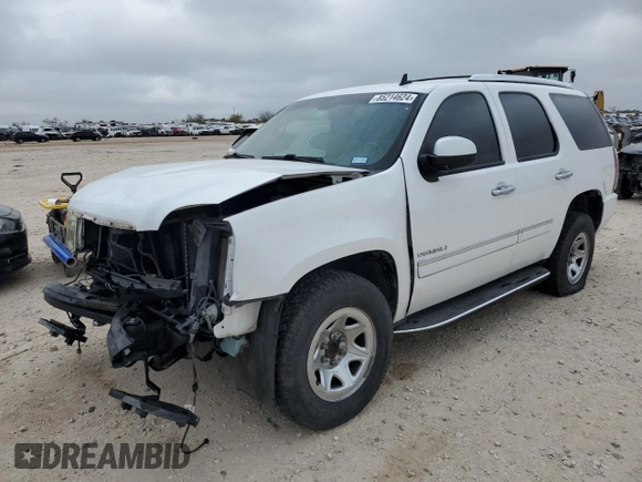 2011 GMC Yukon Denali with VIN 1GKS1EEF7BR400706, listed as a Copart auction lot 85214624 with 326,949 mi miles and Salvage Title. Bid and sale history available at carsss.com. Image 1.