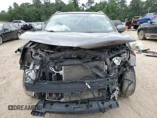 2017 Nissan Rogue SV with VIN JN1BJ1CP4HW013785, listed as a Copart auction lot 57387635 with 139,103 mi miles and Salvage title. Bid and sale history available at DreamBid. Image 5.