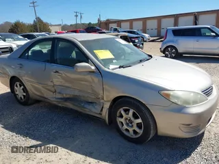 2006 Toyota Camry LE z VIN 4T1BF32K76U631283, wystawiony jako IAAI lot #41828021 z przebiegiem 332 063 mil mil oraz . Historia ofert i sprzedaży dostępna na DreamBid. Obrazek 13.