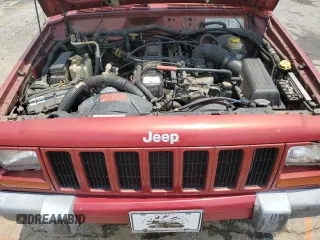 1999 Jeep Cherokee Sport with VIN 1J4FT68SXXL669549, listed as a Copart auction lot 62367015 with 194,446 mi miles and Salvage title. Bid and sale history available at DreamBid. Image 12.