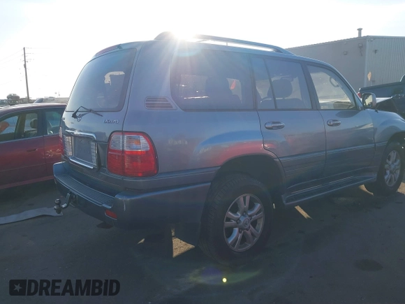 2003 Lexus LX with VIN JTJHT00W133534624, listed as a IAAI auction lot 40993924 with 161,022 mi miles. Bid and sale history available at carsss.com. Image 4.