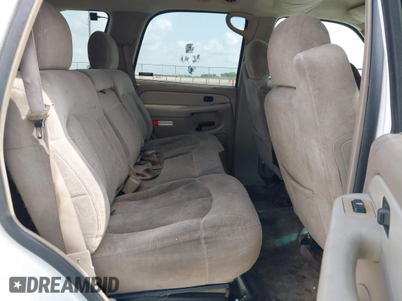 2002 Chevrolet Tahoe LS z VIN 1GNEC13Z42R214489, wystawiony jako IAAI lot #42438810 z przebiegiem 243 161 mil mil oraz . Historia ofert i sprzedaży dostępna na DreamBid. Obrazek 8.