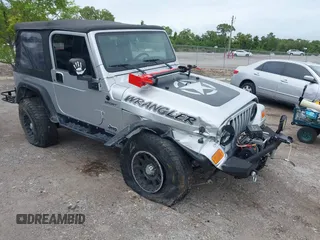 2004 Jeep Wrangler Sport with VIN 1J4FA49S94P798508, listed as a IAAI auction lot 42407034 with 120,386 mi miles and . Bid and sale history available at DreamBid. Image 1.