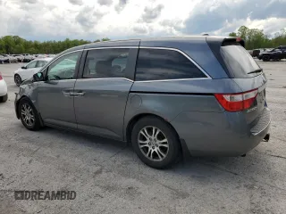 2011 Honda Odyssey EX-L with VIN 5FNRL5H6XBB002136, listed as a Copart auction lot 55162645 with 172,425 mi miles and Salvage Title. Bid and sale history available at DreamBid. Image 2.
