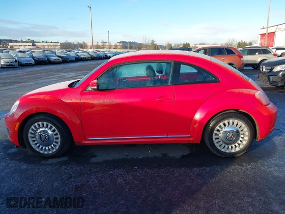 2014 Volkswagen Beetle 2.5L w/Sun with VIN 3VWJP7AT8EM629573, listed as a IAAI auction lot 41479054 with 73,950 mi miles and . Bid and sale history available at DreamBid. Image 14.