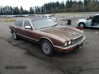 1995 Jaguar XJ with VIN SAJKX1742SC746763, listed as a Copart auction lot 84949964 with Not Provided miles and Clean Title. Bid and sale history available at DreamBid. Image 4.