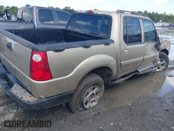 2003 Ford Explorer Sport Trac XLS z VIN 1FMZU77E23UC35868, wystawiony jako IAAI lot #42530211 z przebiegiem 223 483 mil mil oraz . Historia ofert i sprzedaży dostępna na DreamBid. Obrazek 4.