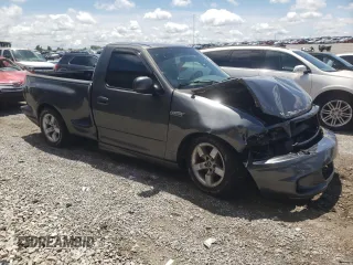 2003 Ford F-150 Lightning with VIN 2FTRF073X3CA56501, listed as a Copart auction lot 61887024 with 0 mi miles and Salvage Title. Bid and sale history available at carsss.com. Image 4.