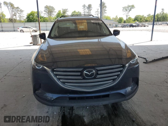 2021 Mazda CX-9 Touring with VIN JM3TCACY7M0528188, listed as a Copart auction lot 53880865 with 63,581 mi miles and Salvage title. Bid and sale history available at DreamBid. Image 5.