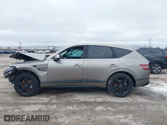 2021 Genesis GV80 with VIN KMUHCESC2MU054572, listed as a IAAI auction lot 41570653 with 62,116 mi miles and . Bid and sale history available at DreamBid. Image 13.