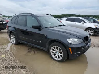 2012 BMW X5 35i with VIN 5UXZV4C50CL989832, listed as a Copart auction lot 62606485 with 157,025 mi miles and Clean title. Bid and sale history available at DreamBid. Image 4.