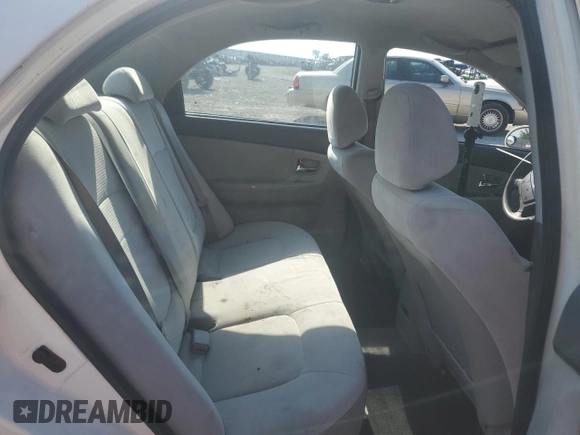 2009 Kia Spectra EX with VIN KNAFE221995624549, listed as a Copart auction lot 65963824 with 244,904 mi miles and Salvage Title. Bid and sale history available at carsss.com. Image 10.