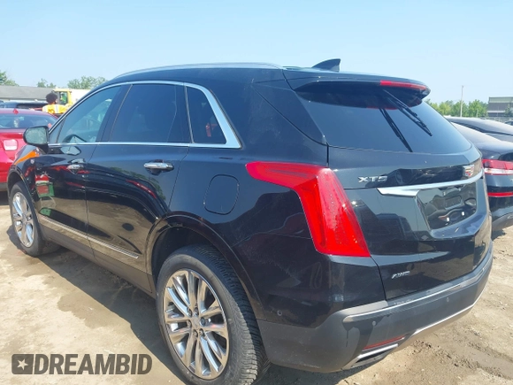 2017 Cadillac XT5 Platinum AWD with VIN 1GYKNFRS6HZ130626, listed as a IAAI auction lot 42470536 with 128,129 mi miles and . Bid and sale history available at DreamBid. Image 3.