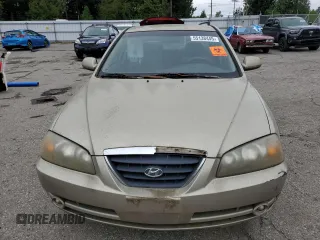 2005 Hyundai Elantra GLS z VIN KMHDN46D05U169323, wystawiony jako Copart lot #55138445 z przebiegiem 142 454 mil mil oraz Czysty tytuł • Clean title. Historia ofert i sprzedaży dostępna na DreamBid. Obrazek 5.
