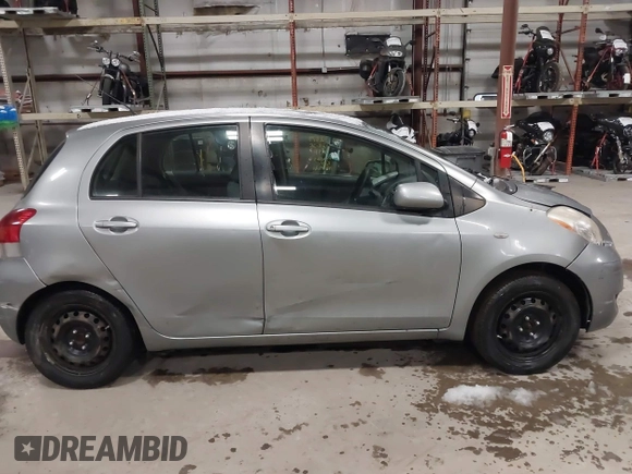 2009 Toyota Yaris with VIN JTDKT903695262863, listed as a IAAI auction lot 41456767 with 206,534 mi miles and . Bid and sale history available at DreamBid. Image 13.