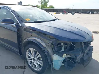 2014 Lincoln MKZ with VIN 3LN6L2GK7ER819756, listed as a IAAI auction lot 42242399 with 140,483 mi miles and . Bid and sale history available at DreamBid. Image 6.