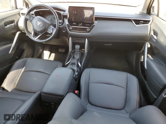 2023 Toyota Corolla Cross XLE with VIN 7MUDAAAG0PV063242, listed as a Copart auction lot 52511585 with 10,695 mi miles and Salvage title. Bid and sale history available at DreamBid. Image 8.