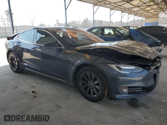 2017 Tesla Model S 60 with VIN 5YJSA1E14HF218274, listed as a Copart auction lot 48485405 with 126,451 mi miles and Salvage title. Bid and sale history available at DreamBid. Image 4.