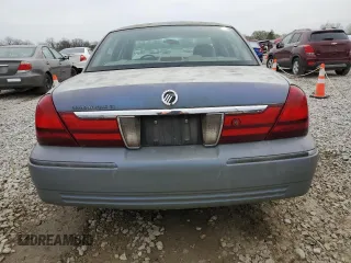 2004 Mercury Grand Marquis GS with VIN 2MEFM74W44X659873, listed as a Copart auction lot 51793205 with 115,384 mi miles and Salvage Title. Bid and sale history available at DreamBid. Image 6.