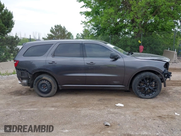 2015 Dodge Durango SXT with VIN 1C4RDJAG0FC947060, listed as a IAAI auction lot 42505938 with 124,705 mi miles and . Bid and sale history available at DreamBid. Image 13.
