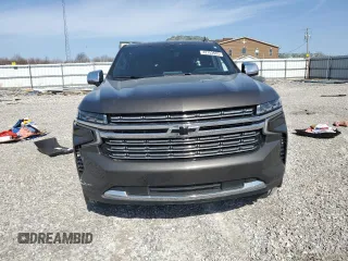 2021 Chevrolet Suburban Premier with VIN 1GNSKFKD5MR155061, listed as a Copart auction lot 42753603 with 58,689 mi miles and . Bid and sale history available at DreamBid. Image 5.