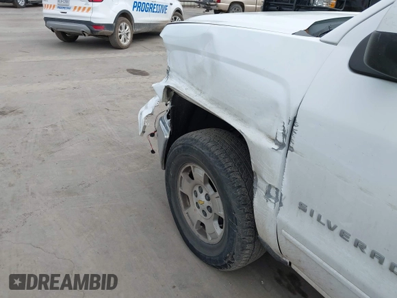 2015 Chevrolet Silverado 1500 LT with VIN 1GCRCREC3FZ425576, listed as a IAAI auction lot 41903363 with 114,156 mi miles and . Bid and sale history available at DreamBid. Image 18.