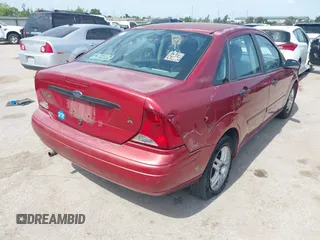 2004 Ford Focus SE z VIN 1FAFP34384W120763, wystawiony jako IAAI lot #42339251 z przebiegiem 262 686 mil mil oraz . Historia ofert i sprzedaży dostępna na DreamBid. Obrazek 4.