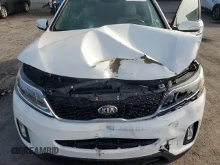 2015 Kia Sorento EX z VIN 5XYKU4A74FG638111, wystawiony jako Copart lot #59790905 z przebiegiem 81 056 mil mil oraz Szkoda całkowita • Salvage title. Historia ofert i sprzedaży dostępna na DreamBid. Obrazek 12.