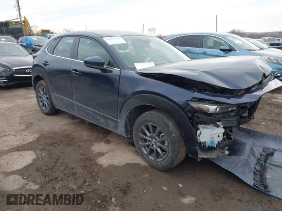 2022 Mazda CX-30 S with VIN 3MVDMBAL8NM411739, listed as a IAAI auction lot 41668265 with 34,964 mi miles and . Bid and sale history available at carsss.com. Image 1.
