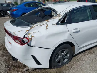 2023 Kia K5 LXS z VIN 5XXG14J25PG189448, wystawiony jako IAAI lot #42258739 z przebiegiem 29 188 mil mil oraz . Historia ofert i sprzedaży dostępna na DreamBid. Obrazek 19.