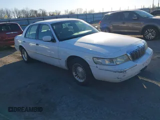 2000 Mercury Grand Marquis LS z VIN 2MEFM75W2YX684288, wystawiony jako IAAI lot #41355523 z przebiegiem 178 166 mil mil oraz . Historia ofert i sprzedaży dostępna na DreamBid. Obrazek 1.