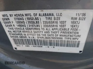 2007 Honda Odyssey LX with VIN 5FNRL38267B029066, listed as a IAAI auction lot 42502433 with 185,721 mi miles and . Bid and sale history available at DreamBid. Image 9.