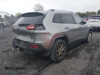 2014 Jeep Cherokee Latitude with VIN 1C4PJMCS5EW198112, listed as a IAAI auction lot 40417706 with 169,921 mi miles. Bid and sale history available at carsss.com. Image 4.
