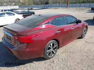 2016 Nissan Maxima Platinum z VIN 1N4AA6AP1GC416590, wystawiony jako IAAI lot #41817288 z przebiegiem 248 514 mil mil oraz . Historia ofert i sprzedaży dostępna na DreamBid. Obrazek 4.