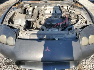 1999 Mitsubishi 3000GT z VIN JA3AM44HXXY002638, wystawiony jako Copart lot #67132454 z przebiegiem 181 684 mil mil oraz Tytuł czysty. Historia ofert i sprzedaży dostępna na DreamBid. Obrazek 11.