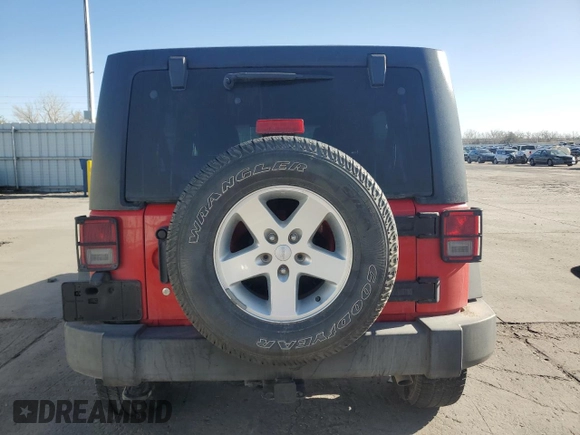 2015 Jeep Wrangler Unlimited Willys Wheeler with VIN 1C4BJWDG8FL574014, listed as a Copart auction lot 51921255 with 54,134 mi miles and Salvage Title. Bid and sale history available at DreamBid. Image 6.