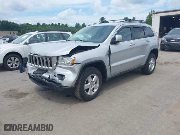 2011 Jeep Grand Cherokee Laredo with VIN 1J4RR4GG3BC734683, listed as a IAAI auction lot 42656716 with 151,220 mi miles and . Bid and sale history available at DreamBid. Image 2.