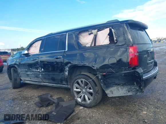 2018 Chevrolet Suburban Premier with VIN 1GNSCJKC2JR199702, listed as a IAAI auction lot 41136128 with 80,103 mi miles and . Bid and sale history available at DreamBid. Image 13.