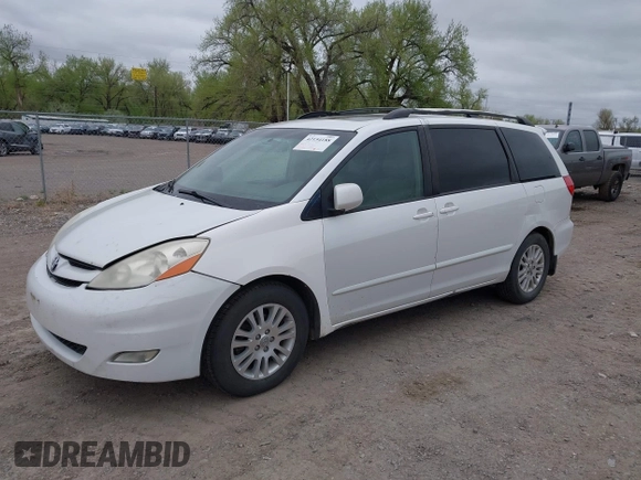 2007 Toyota Sienna XLE with VIN 5TDZK22C57S081282, listed as a IAAI auction lot 42154188 with 245,815 mi miles. Bid and sale history available at carsss.com. Image 2.