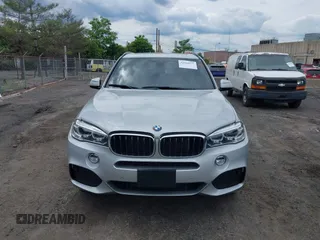 2018 BMW X5 xDrive35i z VIN 5UXKR0C5XJ0Y00343, wystawiony jako IAAI lot #42368337 z przebiegiem 52 101 mil mil oraz . Historia ofert i sprzedaży dostępna na DreamBid. Obrazek 12.