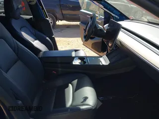 2023 Tesla Model Y Long Range with VIN 7SAYGDEE6PF847890, listed as a IAAI auction lot 41635687 with 32,846 mi miles and . Bid and sale history available at DreamBid. Image 5.