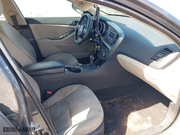 2015 Kia Optima LX with VIN KNAGM4A71F5634755, listed as a IAAI auction lot 42019729 with 101,064 mi miles. Bid and sale history available at carsss.com. Image 5.