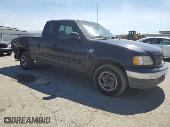 2000 Ford F-150 XL with VIN 1FTRX17L0YKA29295, listed as a Copart auction lot 50719525 with 0 mi miles and Salvage Title. Bid and sale history available at carsss.com. Image 4.