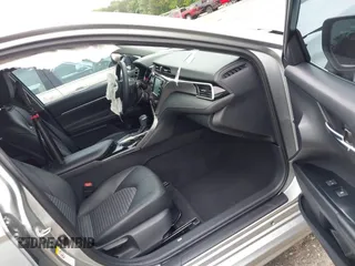 2018 Toyota Camry LE z VIN 4T1B11HK3JU129549, wystawiony jako IAAI lot #42159243 z przebiegiem 76 299 mil mil oraz . Historia ofert i sprzedaży dostępna na DreamBid. Obrazek 5.