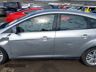 2017 Ford Focus Titanium with VIN 1FADP3N26HL309903, listed as a IAAI auction lot 41642306 with 107,762 mi miles and . Bid and sale history available at carsss.com. Image 14.