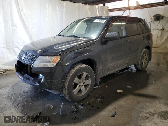 2011 Suzuki Grand Vitara Premium z VIN JS3TD0D24B4103142, wystawiony jako Copart lot #43715135 z przebiegiem 170 422 mil mil oraz Szkoda całkowita • Salvage title. Historia ofert i sprzedaży dostępna na DreamBid. Obrazek 1.