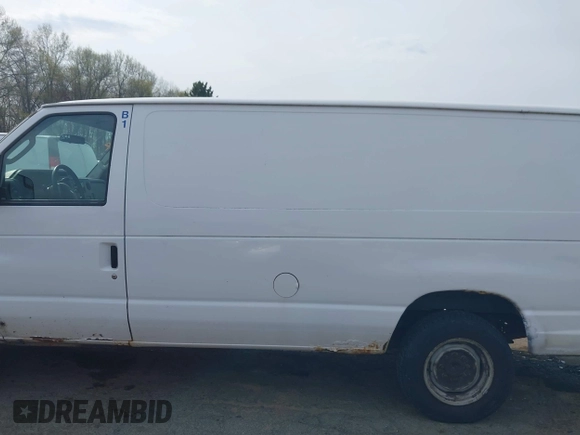 2011 Ford Econoline Cargo Commercial with VIN 1FTNS1EW6BDA73839, listed as a IAAI auction lot 42129534 with 407,047 mi miles. Bid and sale history available at carsss.com. Image 14.
