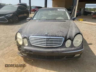 2003 Mercedes-Benz E-Class 3.2L with VIN WDBUF65JX3A313638, listed as a Copart auction lot 70869194 with 142,524 mi miles and Salvage Title. Bid and sale history available at carsss.com. Image 5.