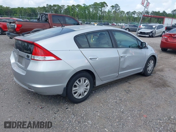 2010 Honda Insight LX with VIN JHMZE2H52AS038807, listed as a IAAI auction lot 42120846 with 242,816 mi miles and . Bid and sale history available at DreamBid. Image 4.